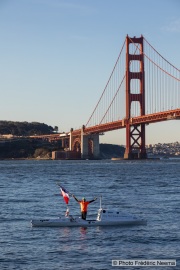 Kayaker Cyril Derreumaux waves a French flag during training in the San Francisco Bay on February 25, 2021, with the Golden gate Bridge in the background.France-born American entrepreneur Cyril Derreumaux (44) will leave at the end of May 2021 for a 70-day solo and unsupported sea kayak Pacific crossing from California to Hawaii.